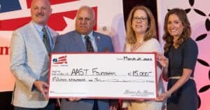American Association of State Troopers 15000 Homes for Heroes Foundation Grant Awarded on stage at 2024 Success Camp