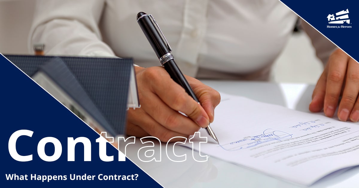 Person signing their name on a contract with a pen