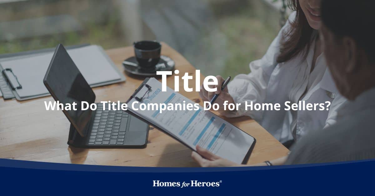 representative explaining what do title companies do for home seller sitting at desk reviewing title insurance Homes for Heroes