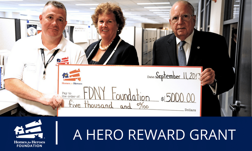 Homes for Heroes Specialist, Benny Persichetti, presents the FDNY Foundation with a $5,000 grant on behalf of the Homes for Heroes Foundation.