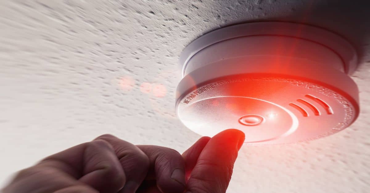 Smoke Detector Red Light Hand Pressing Test Button