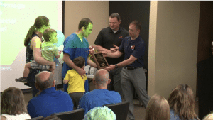 Homes for Heroes presents nurse with Hero of the Month award