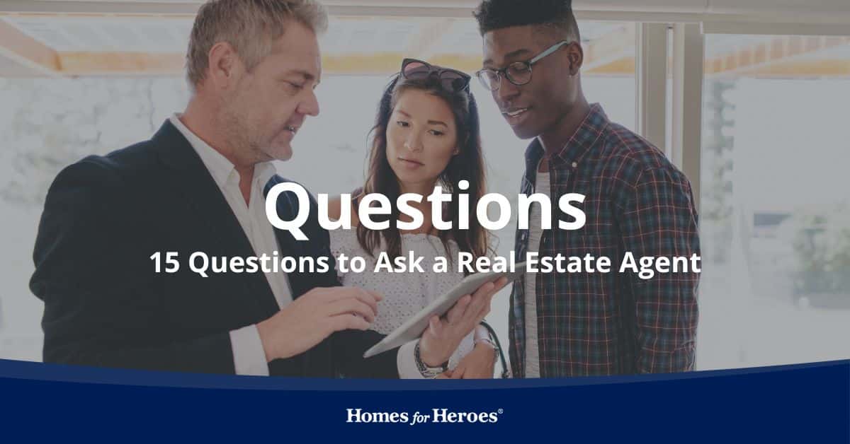 home buyer couple with questions to ask a real estate agent on tablet while walking through house for sale