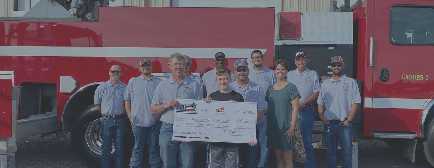 Homes for Heroes Check Presentation Running 4 Heroes Firefighters