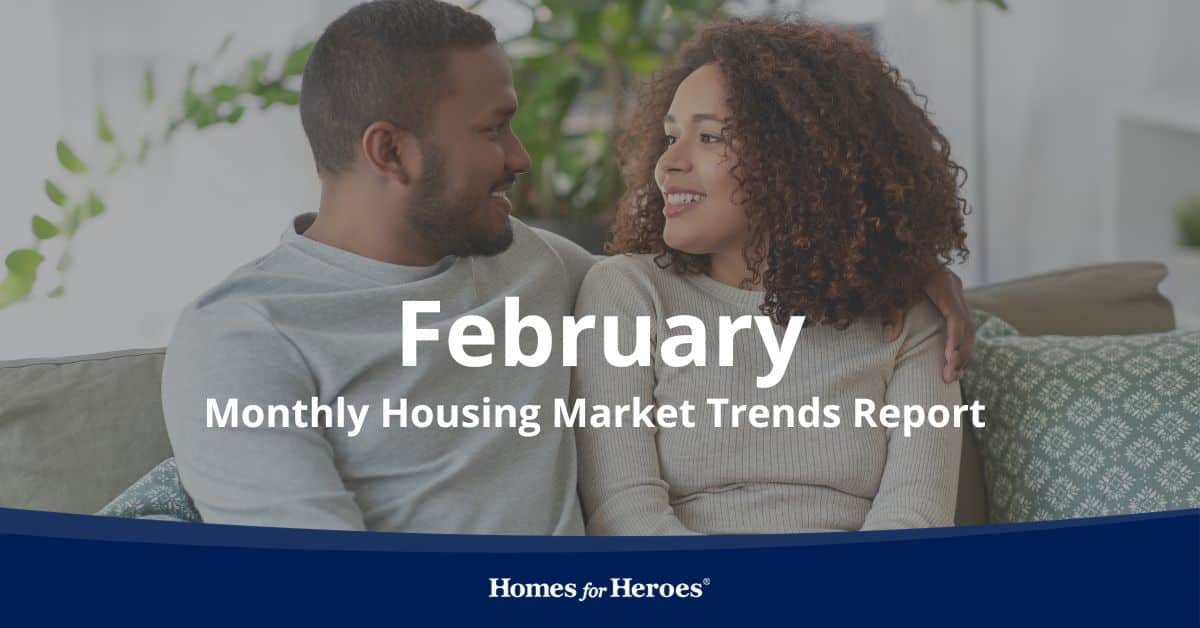 couple sitting on couch in house looking at each other discussing housing market trend february 2024 Homes for Heroes