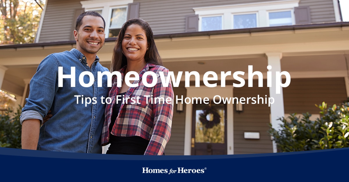 Homeownership with two first time home owners in front of the house Homes for Heroes helped them find