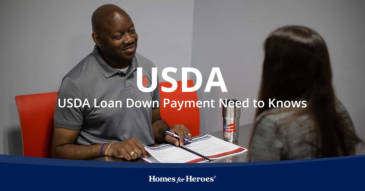 Two people talking across a desk about the USDA loan down payment program and how to get it.