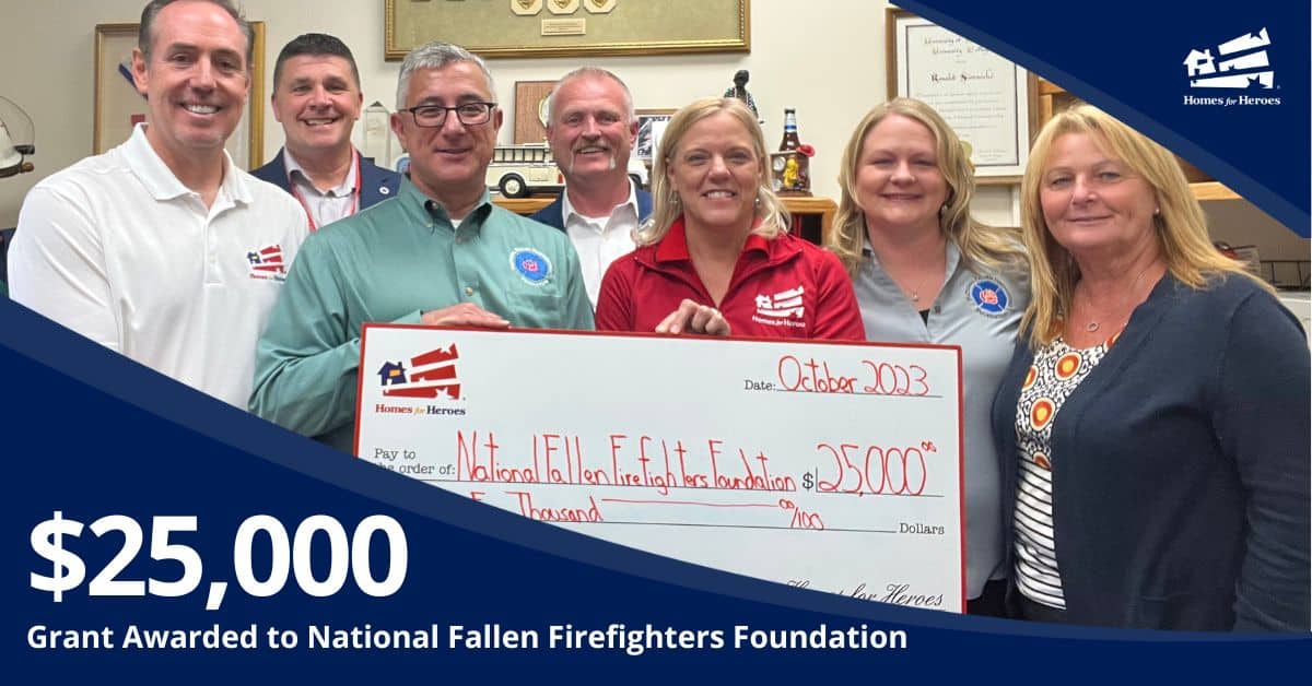 big grant check presented to National Fallen Firefighters Foundation from Homes for Heroes Foundation October 2023 hero grant