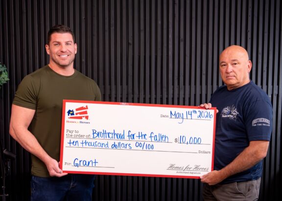Homes for Heroes presents a $10,000 check to Brotherhood for the Fallen