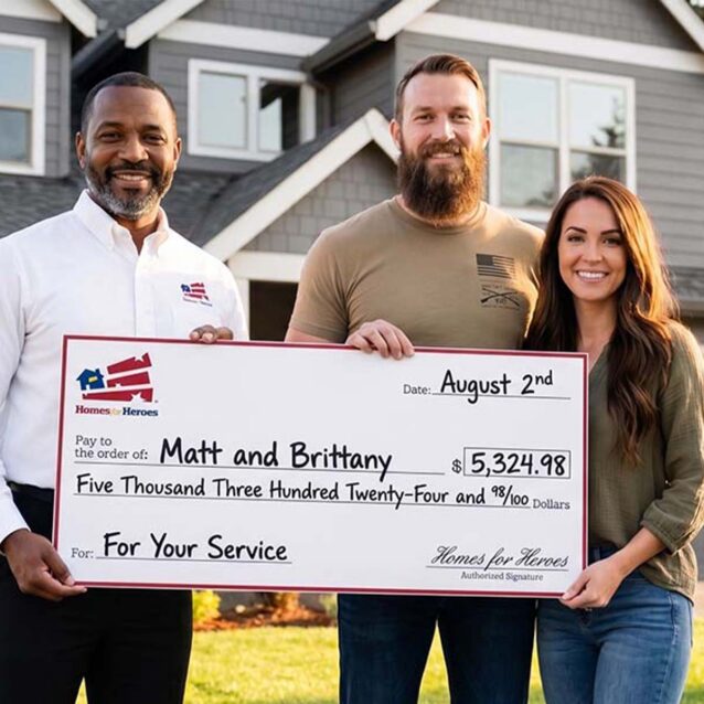 Matt, Brittany, and their program specialist proudly displaying a giant Hero Rewards saving check for $5,324.98 outside their newly purchased house.